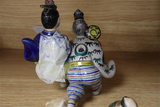 Three Japanese porcelain groups or figures